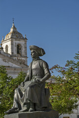 Fototapeta premium statue of Infante D. Henrique, also known as Prince Henry the Navigator, located in the historic old town of Lagos, Portugal