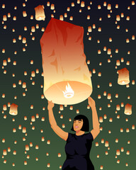 Girl releasing religious sky lantern at night © Biruoh