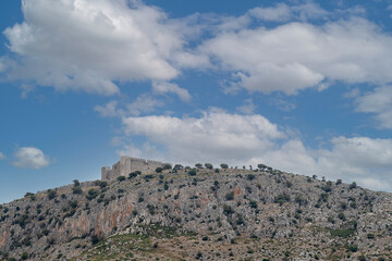 Fototapeta na wymiar castle on top of a mountain in torroella de montgri on the costa brava of girona