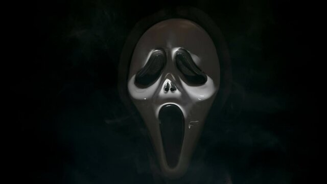 Closer look of the spooky face ghost mask during the halloween night