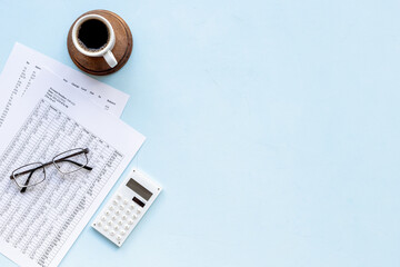 Taxes accounting on office table with calculator,top view