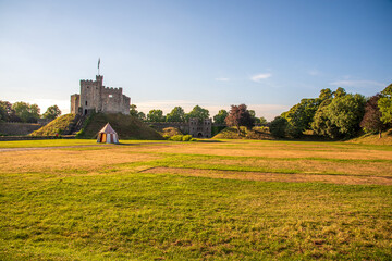 Norman Keep, and battlements with tent in the foreground of the gardens Cardiff Castle,Panoramic, Autumn, Cardiff, Wales, UK