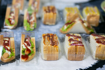 Sanwich including of vegetables, sliced cheese or ham. Homemade sanwich make it for sale, can use for breakfast meal.