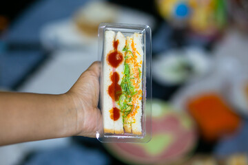 Sanwich including of vegetables, sliced cheese or ham. Homemade sanwich make it for sale, can use for breakfast meal.