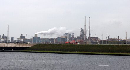 Obraz premium Port of Ijmuiden, the Netherlands. Calm North sea water, misty day. 
