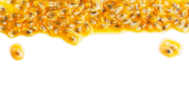 Puddle of pulp and passionfruit juice with drops at the top of the image on a white background.