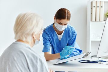 elderly woman and doctor professional examination checkup