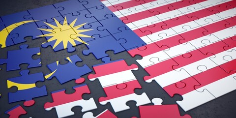 Fototapeta premium Messy pieces of puzzle with flag of Malaysia. 