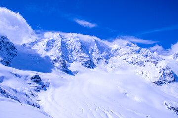Fototapeta na wymiar Alpine landscape from Diavolezza, a peak and ski resort above the Val Bernina in Graubünden