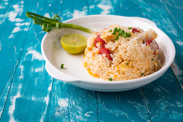 Asian Fried Jasmin rice with sausage and eggs.