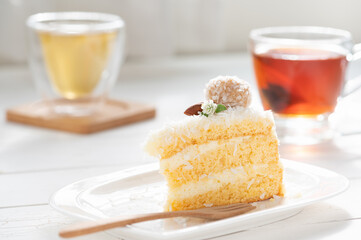 Slice Of Coconut Cake With Afternoon Tea
