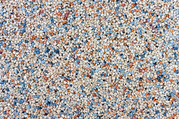 Pebbles of different colors abstract background