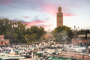 Fototapeta na wymiar view of Koutoubia Mosque and Jamaa El Fna square crowded