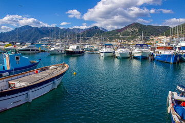 Fototapeta na wymiar Amazing sunny day oin October in harbor od Salerno : pleasure boats and fishing boats