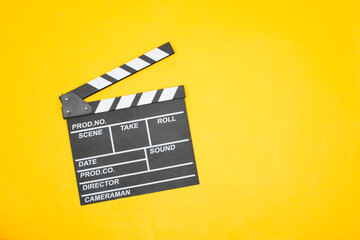 movie clapper a on yellow background