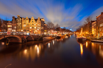 Obraz na płótnie Canvas Amsterdam, Netherlands Bridges and Canals