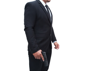 A gun man side view in a black suit standing with a pistol in a stern pose, on a isolated white...