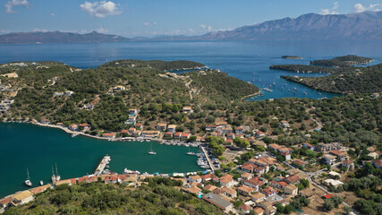Fototapeta premium Aerial drone photo of fjord bay and port of Vathi a natural sail boat anchorage in island of Meganisi, Ionian, Greece