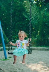 child on swing