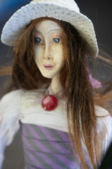 Doll in straw hat