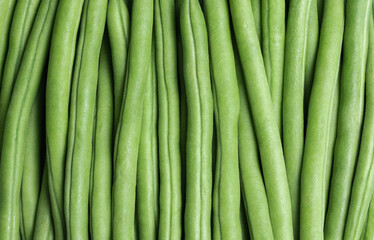 Pile of green beans as background. Top view