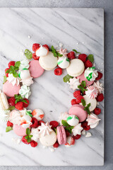 Christmas dessert wreath with macarons and meringues