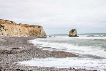 Fototapeta na wymiar Beautiful deserted beach at Freshwater Bay Isle of Wight Hampshire England