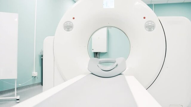 Bright room with modern MRI machine
