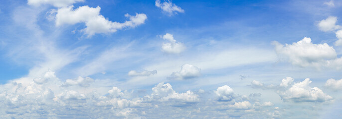 Panorama fluffy clouds against in blue sky