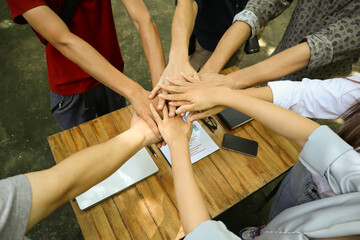 Hand team of cooperation in the construction business.To succeed in developing sustainable partnerships.concept