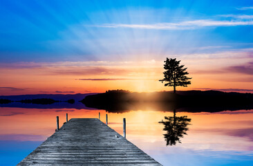 Fototapeta na wymiar reflejos en el lago cuando amanece