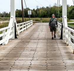 a person walking on the bridge
