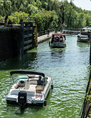 boats going through one of the lock gates for the Rideau canal 
