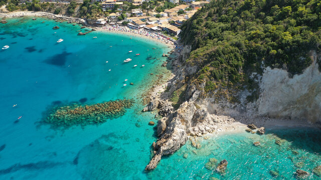 Aerial drone photo of small rocky cove near popular traditional village of Agios Nikitas, Lefkada island, Ionian, Greece