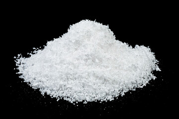 Heap of white snow on black background. Sparkling fluffy white snow hill.