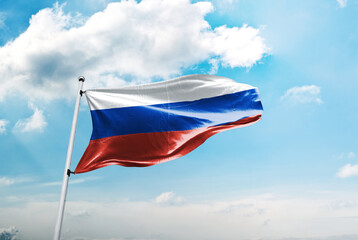 Fototapeta na wymiar Russia flag in the blue sky