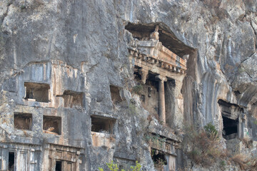 Obraz premium Fethiye, Turkey - September 16, 2021. Lycian rock cut tombs of Fethiye.