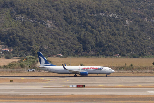 Dalaman, Turkey - September 17, 2021. AnadoluJet plane at the Dalaman Airport.