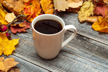 White cup with black tea