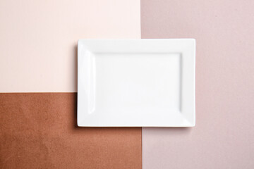 White clean plate on color background