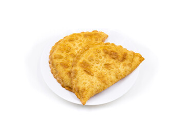 Chebureks on a white background. Caucasian cuisine.