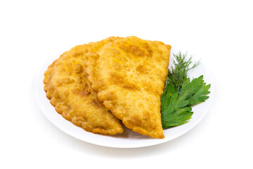 Chebureks on a white background. Caucasian cuisine.
