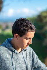 Half body photo of latin teenage boy with black hair