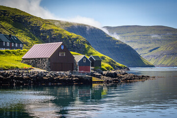 fishing huts in vestmanna village,  streymoy island, faroe islands, north atlantic, europe