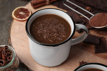 Cup of tasty hot chocolate on table