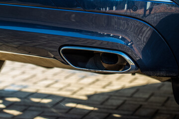 Close up of a car exhaust pipe. Exhaust pipe.