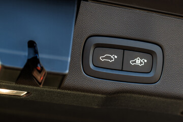 Obraz na płótnie Canvas Car trunk open button. Electric trunk switch controller. Car trunk electric lock button.