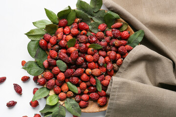 Dried rose hip berries on white background