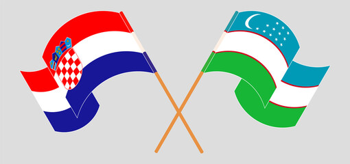 Crossed and waving flags of Croatia and Uzbekistan