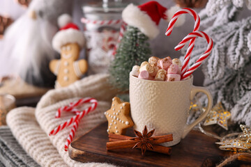 Christmas candy cane heart shape, bokeh background.